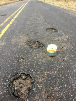 pothole and hat