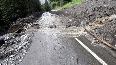 Road washed out by severe flooding