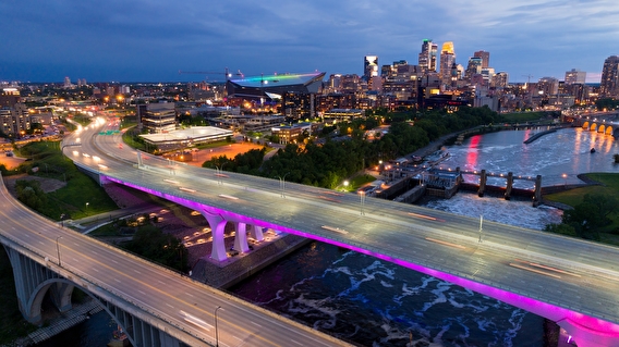 Aerial view of the I-35W bridge over the Mississippi River with Minneapolis in the background