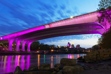 night bridge lit up purple