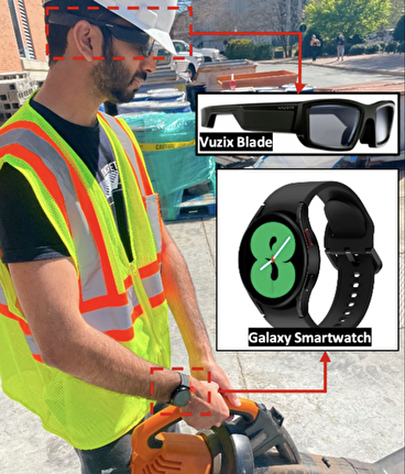 Worker in a safety vest wearing prototype glasses and smart watch